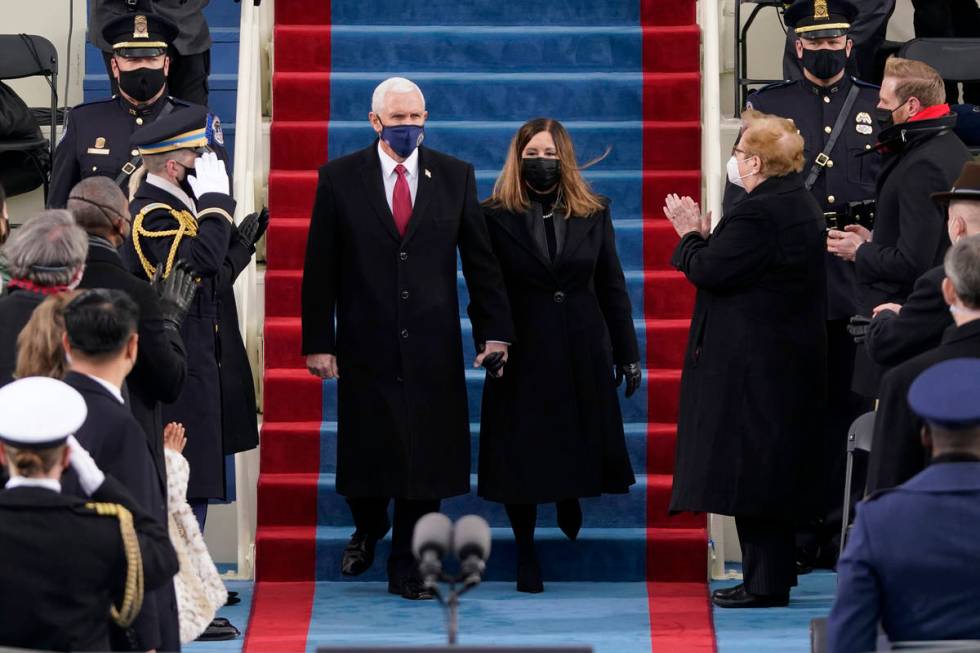 Vice President Mike Pence and his wife Karen, arrive for the 59th Presidential Inauguration at ...