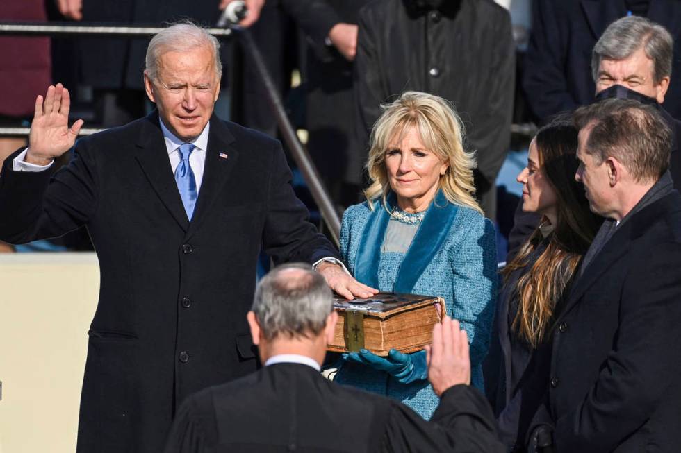 Joe Biden is sworn in as the 46th president of the United States by Chief Justice John Roberts ...