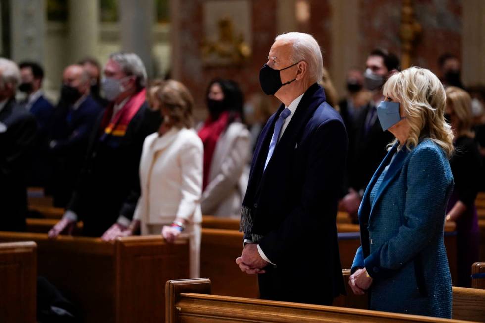 President-elect Joe Biden and his wife Jill Biden attend Mass at the Cathedral of St. Matthew t ...