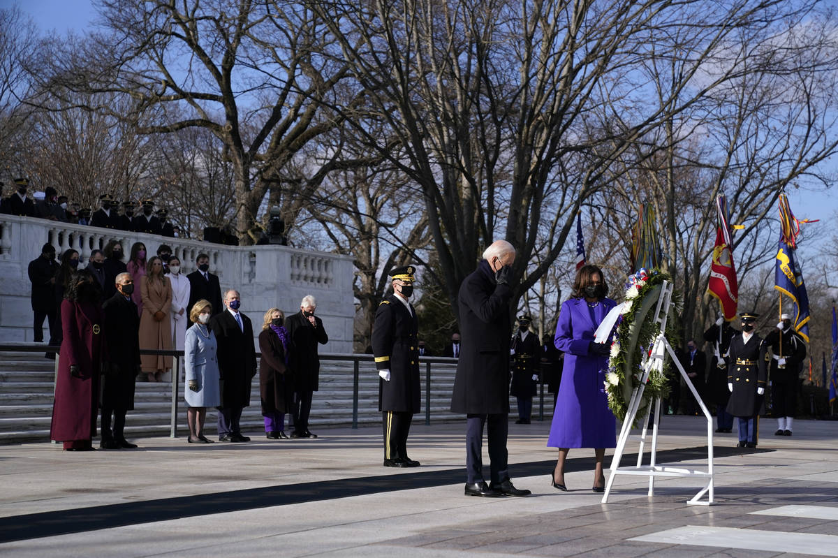 President Joe Biden and Vice President Kamala Harris participate in a wreath laying ceremony at ...