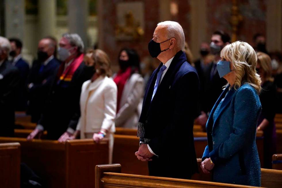 President-elect Joe Biden is joined his wife Jill Biden as they celebrate Mass at the Cathedral ...