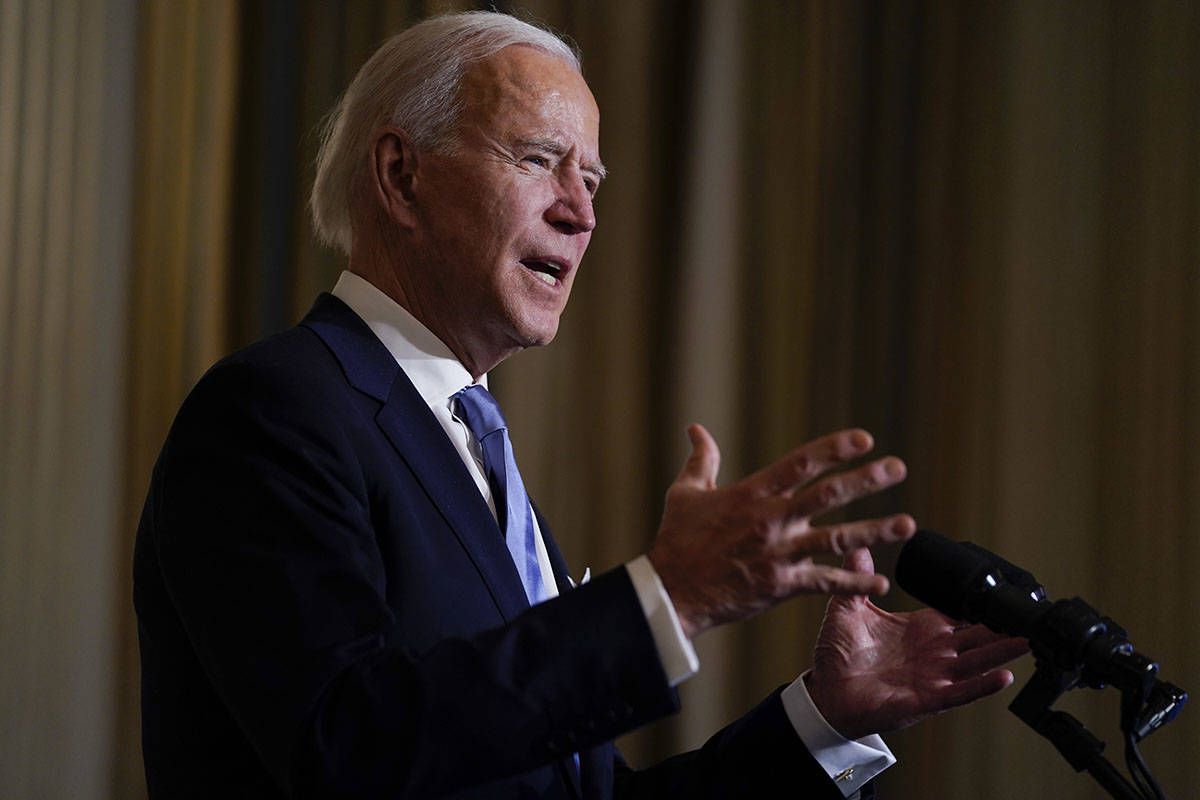 President Joe Biden speaks during a virtual swearing in ceremony of political appointees from t ...