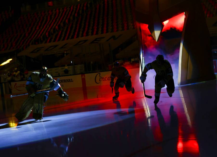 The Golden Knights warm up before taking on the Arizona Coyotes in an NHL hockey game at T-Mobi ...