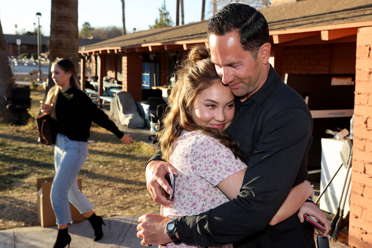 Kyle Kimoto gets a hug from his daughter Kahlea Kimoto, 20, at Jewel's Marty Hennessy Inspiring ...