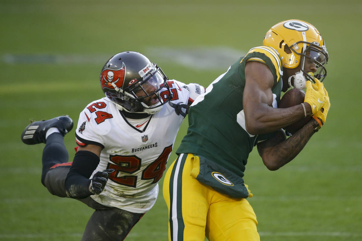 Green Bay Packers' Marquez Valdes-Scantling pulls in a 50-yard touchdown pass against Tampa Bay ...