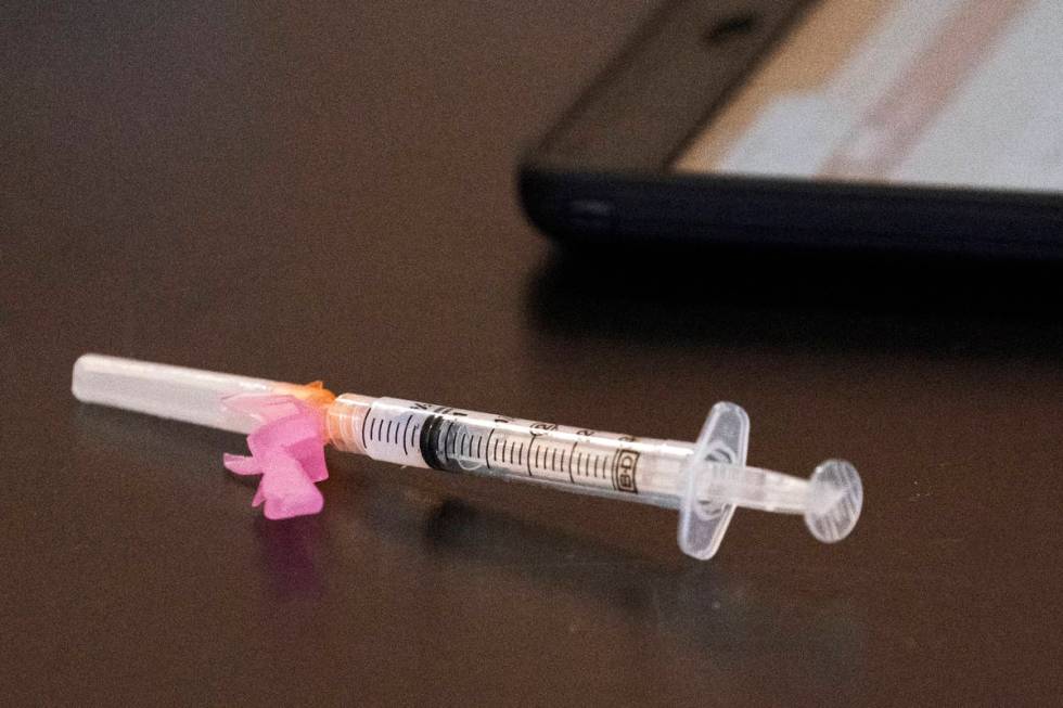 FILE - In this Monday, Jan. 11, 2021, file photo, a syringe with the Moderna coronavirus vaccin ...