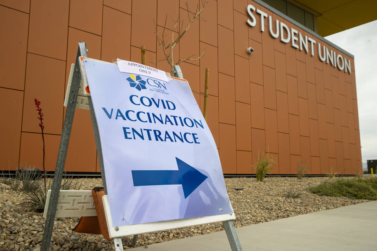 Sign outside the student union for the newly opened COVID-19 vaccination clinic at CSN in Hende ...