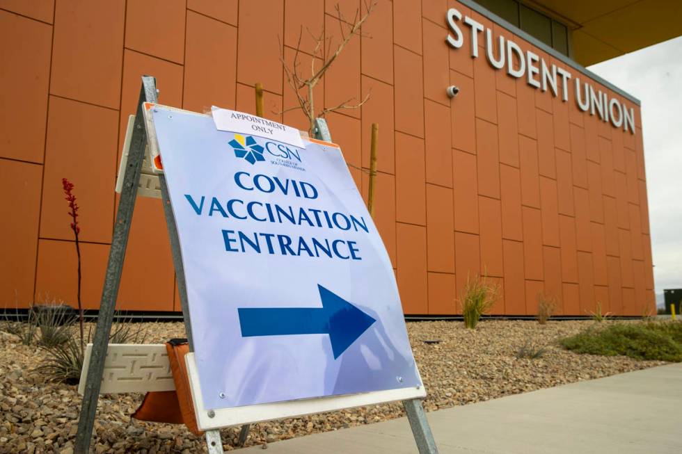 Sign outside the student union for the newly opened COVID-19 vaccination clinic at CSN in Hende ...