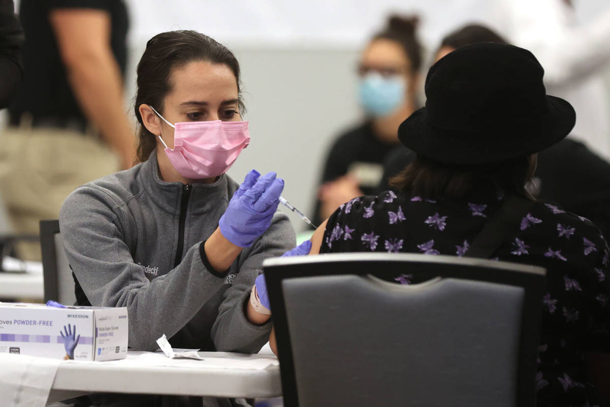 Nursing student Ashley Prandecki gives a COVID-19 vaccine during a UNLV Medicine clinic in the ...