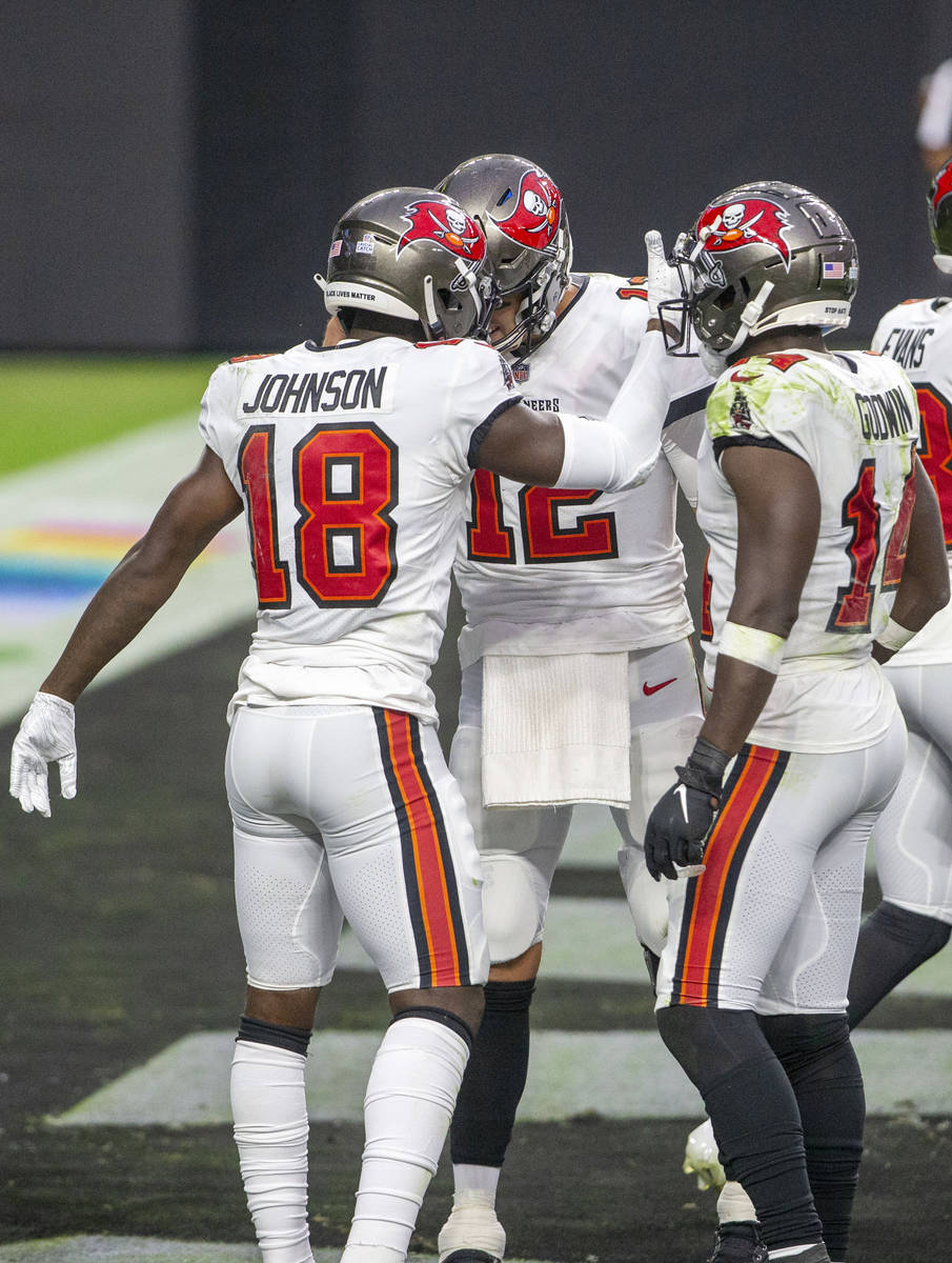 Tampa Bay Buccaneers wide receiver Tyler Johnson (18) celebrates his touchdown score with quart ...