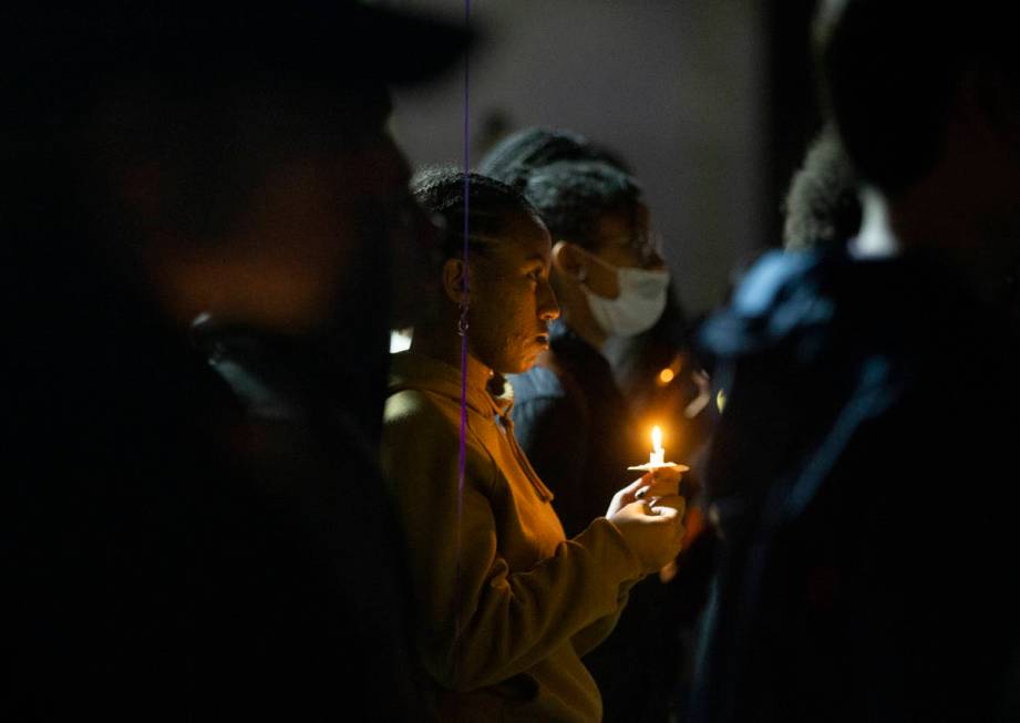 Attendees listen to stories about the impact Kobe Bryant had on his fans lives during a vigil f ...