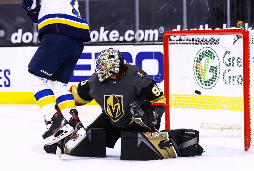 St. Louis Blues left wing Jaden Schwartz (17) jumps to avoid the puck as it flies past Golden K ...