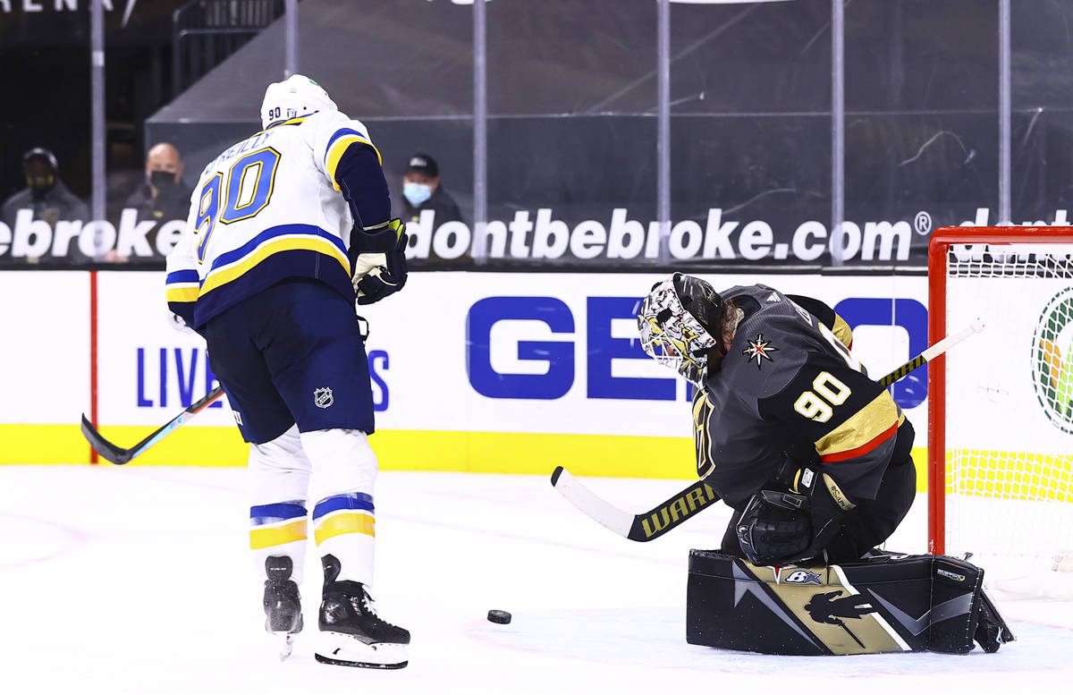 Golden Knights goaltender Robin Lehner (90) blocks a shot by St. Louis Blues center Ryan O'Reil ...