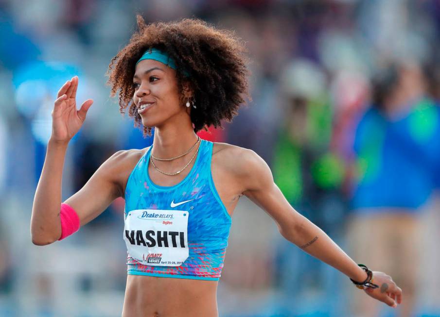 Vashti Cunningham waves to the crowd after winning the women's special high jump at the Drake R ...