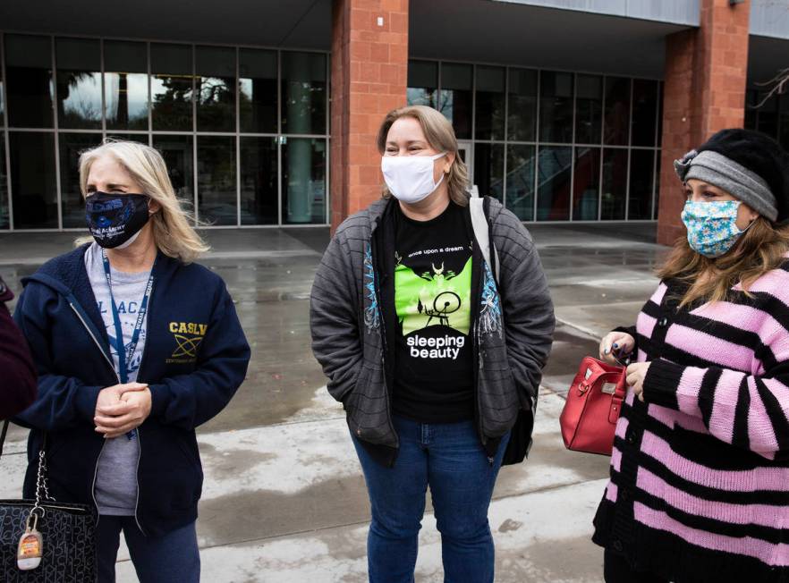 Coral Academy of Science teachers, Janet Roth, left, Samantha Richards, and Dana Wilson, right, ...