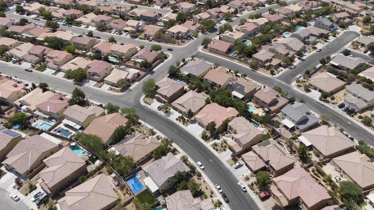 An aerial view of housing near Night Owl Bluff Avenue and West Gentle Brook Street in North Las ...