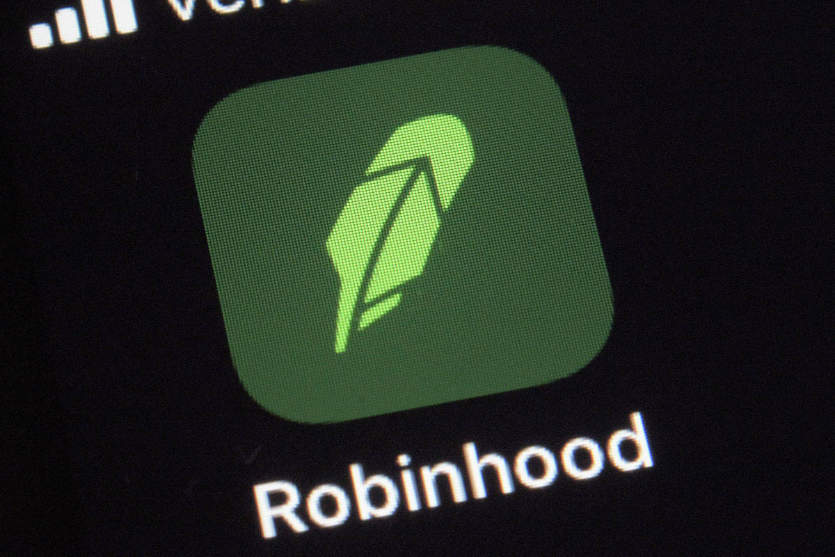 This Dec. 17, 2020 file photo shows the logo for the Robinhood app on a smartphone in New York ...