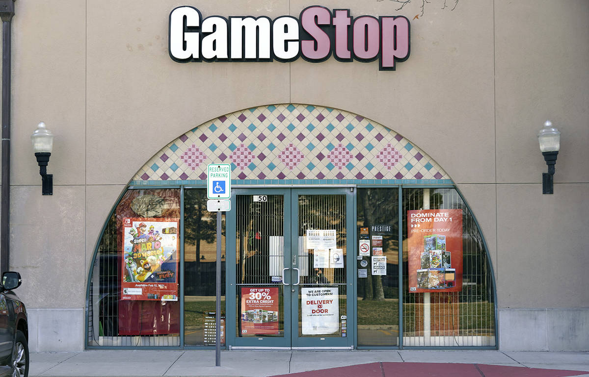 A GameStop storefront is shown before opening Thursday morning, Jan. 28, 2021, in Dallas. The ...