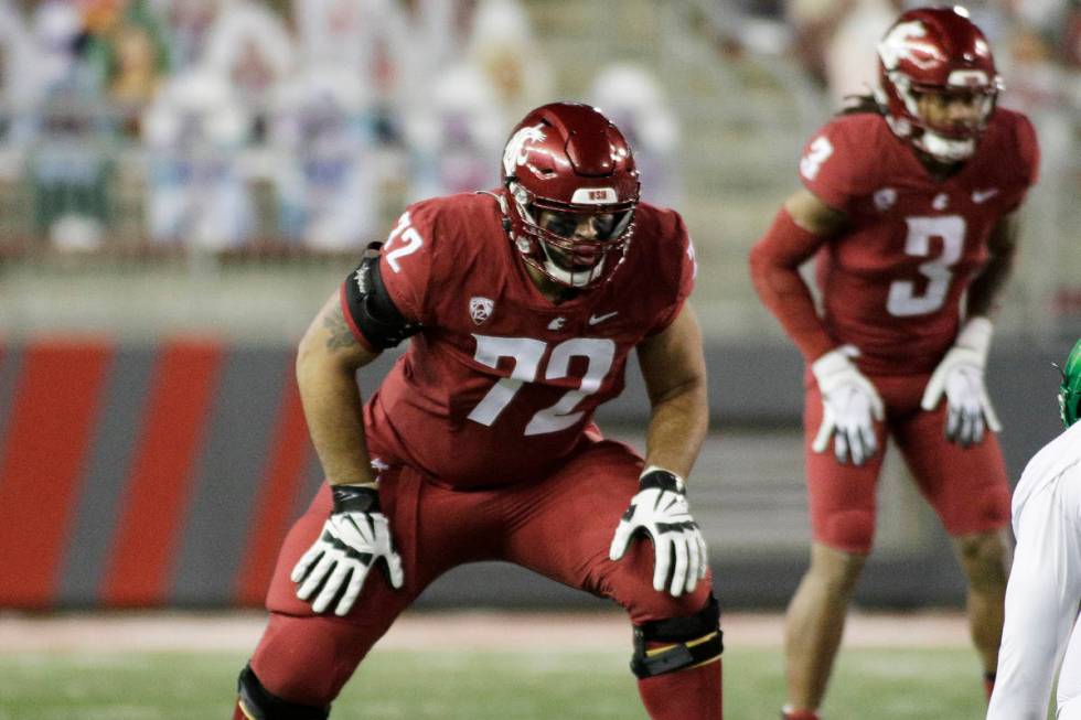 Washington State offensive lineman Abraham Lucas (72) lines up for a play during the first half ...