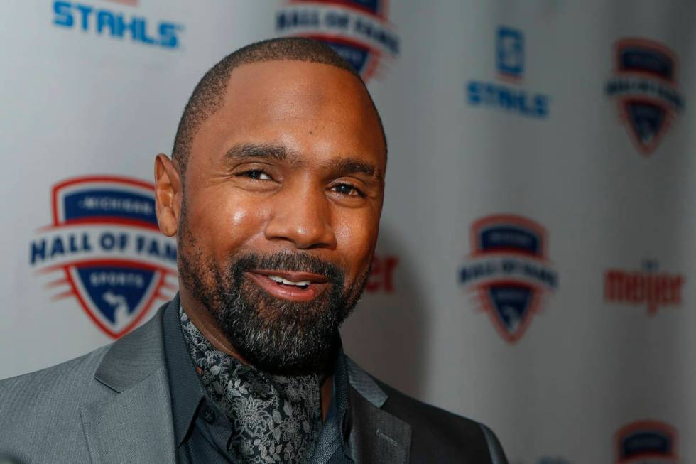 FILE - Charles Woodson is interviewed before induction ceremonies at the Michigan Sports Hall o ...