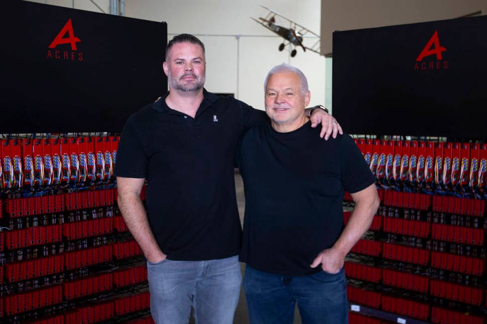 Noah Acres, left, and John Acres, makers of a new player tracking system, pose for a photo at A ...