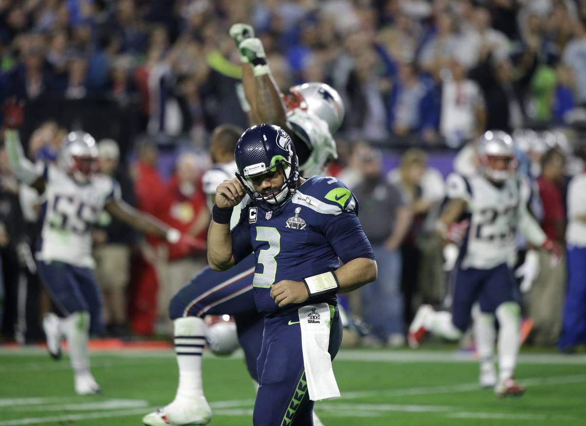 In this Feb. 1, 2015, file photo, Seattle Seahawks quarterback Russell Wilson (3) reacts after ...