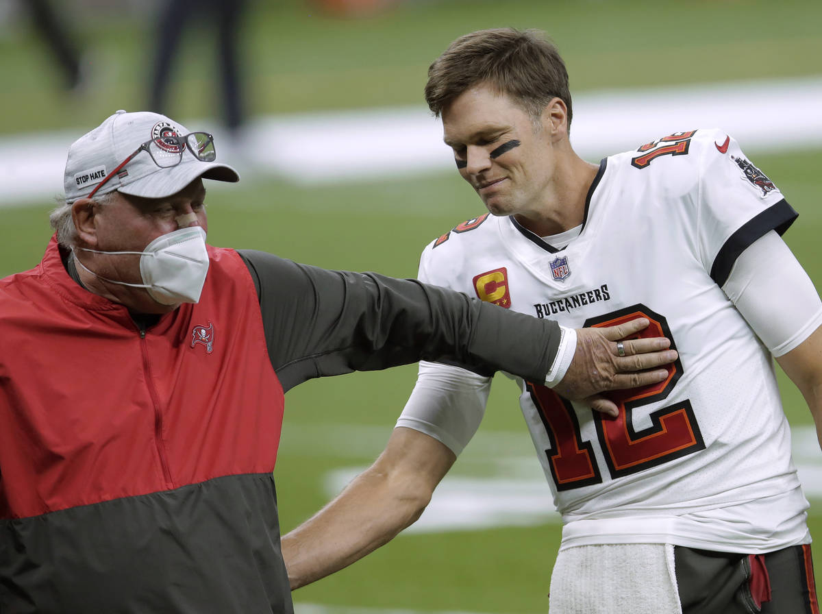 FILE - In this Jan. 17, 2021, file photo, Tampa Bay Buccaneers coach Bruce Arians, left, speaks ...