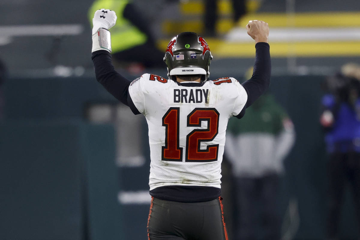 Tampa Bay Buccaneers quarterback Tom Brady reacts after winning the NFC championship NFL footba ...