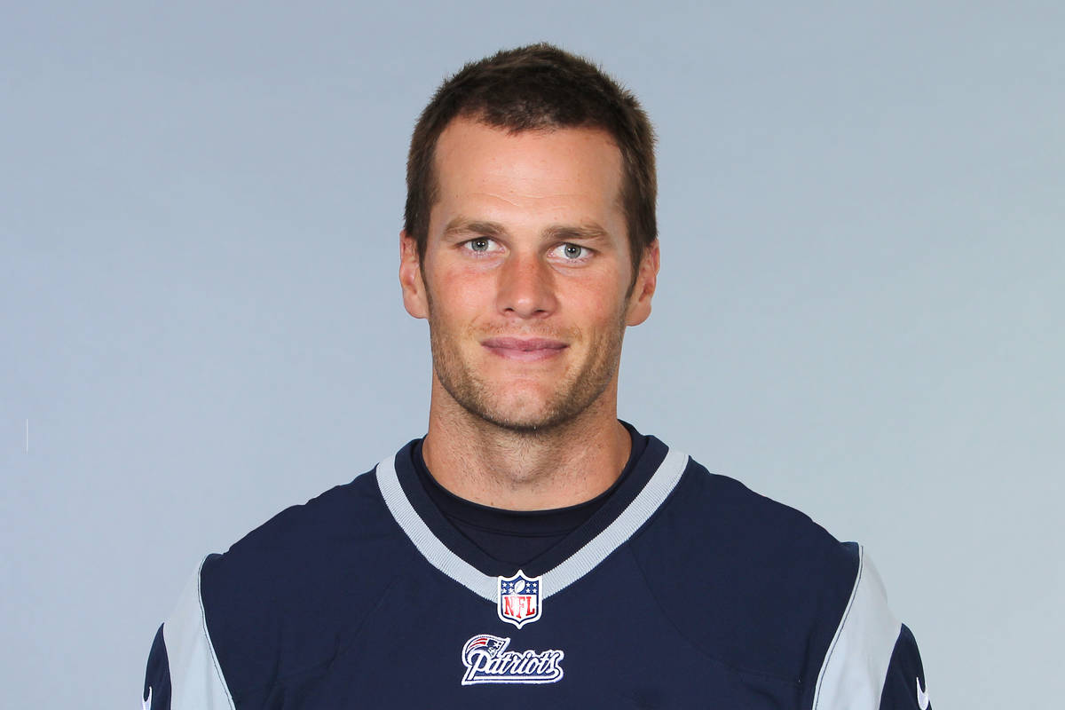 This is a photo of Tom Brady of the New England Patriots NFL football team. This image reflects ...