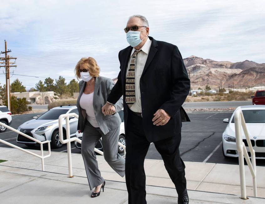 Patricia, left, and her husband Marcel Chappuis arrive at Beatty Justice Court for their hearin ...