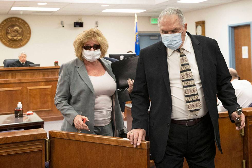 Patricia, left, and her husband Marcel Chappuis leave Beatty Justice Court after their hearing ...