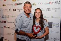 Former Las Vegas Americans soccer star Chico Borja, left, is shown with heart transplant recipi ...