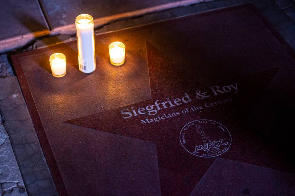 Candles are lit in memory of Siegfried Fischbacher, half of the legendary illusion team Siegfri ...