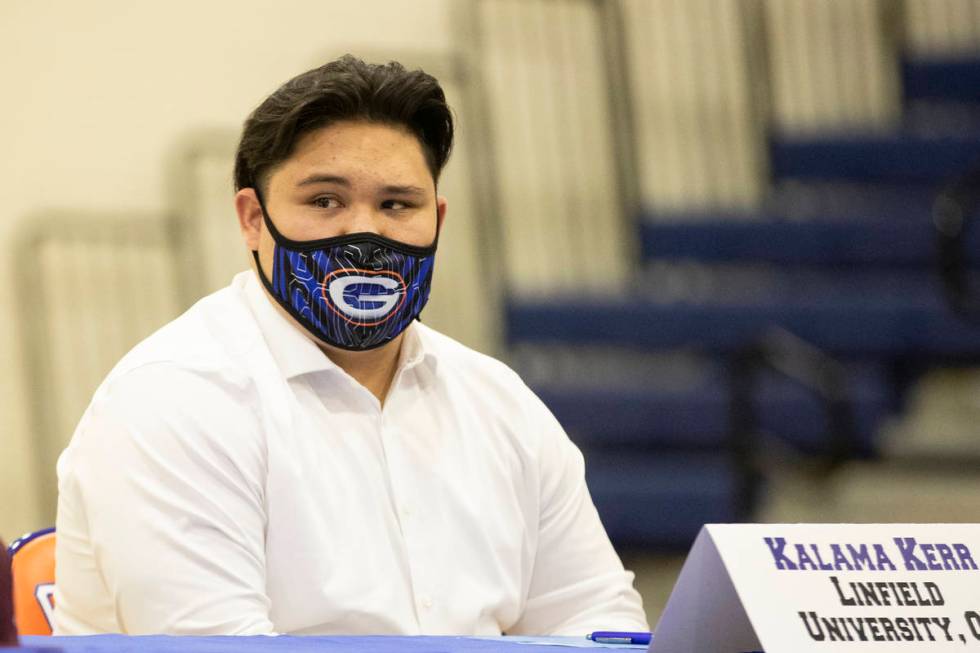 Football player Kalama Kerr, a Linfield University commit, participates during a Signing day c ...