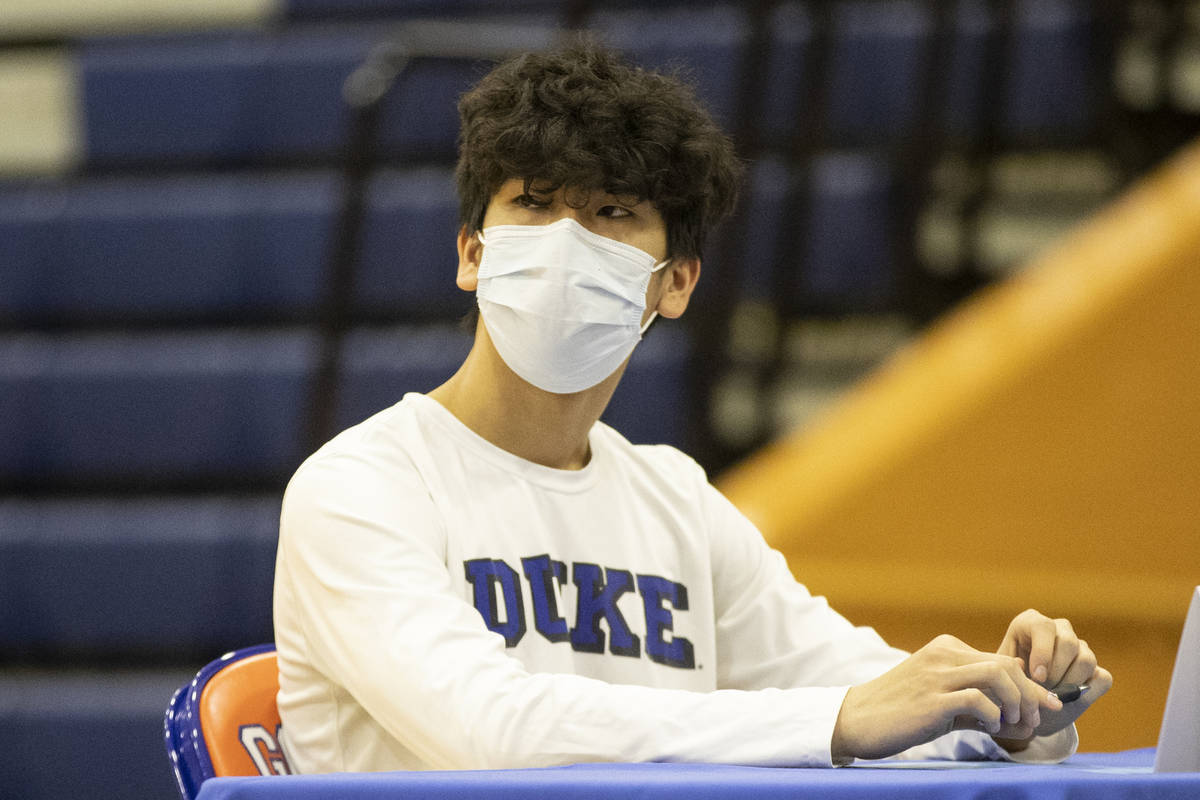 Fencer Ethan Nguyen, a Duke University commit, participates during a Signing day ceremony at Bi ...