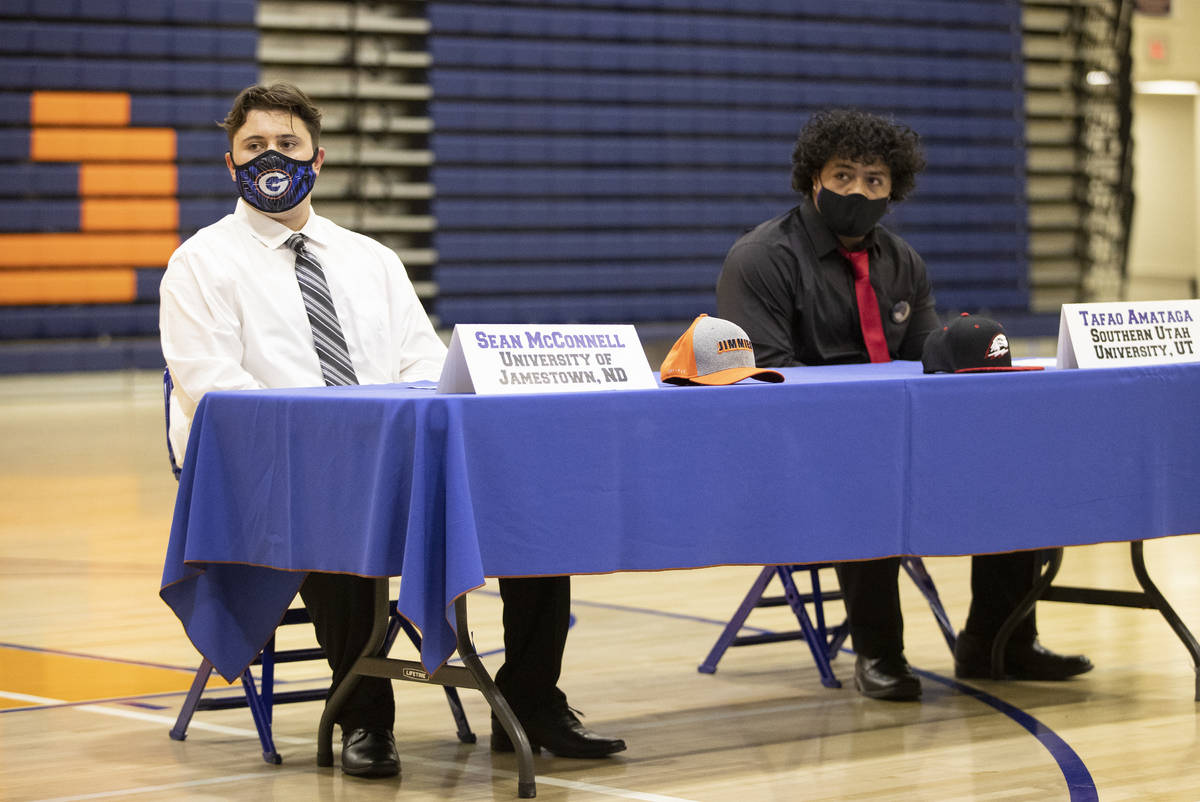 Football players Sean McConnell, left, a Jamestown University commit, and Tafao Amataga, a Sout ...