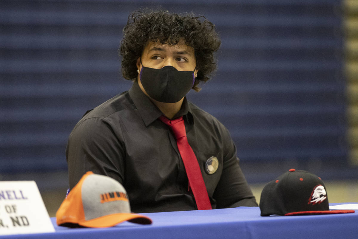 Football player Tafao Amataga, a Southern Utah University commit, participates during a Signing ...