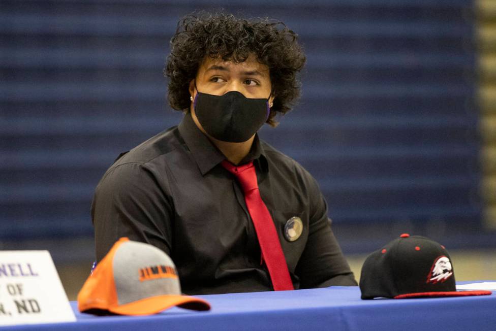 Football player Tafao Amataga, a Southern Utah University commit, participates during a Signing ...