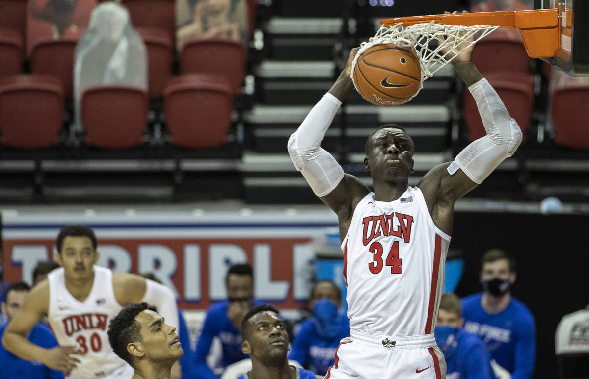 UNLV Rebels forward Cheikh Mbacke Diong (34) dunks in the first half during an NCAA mens basket ...