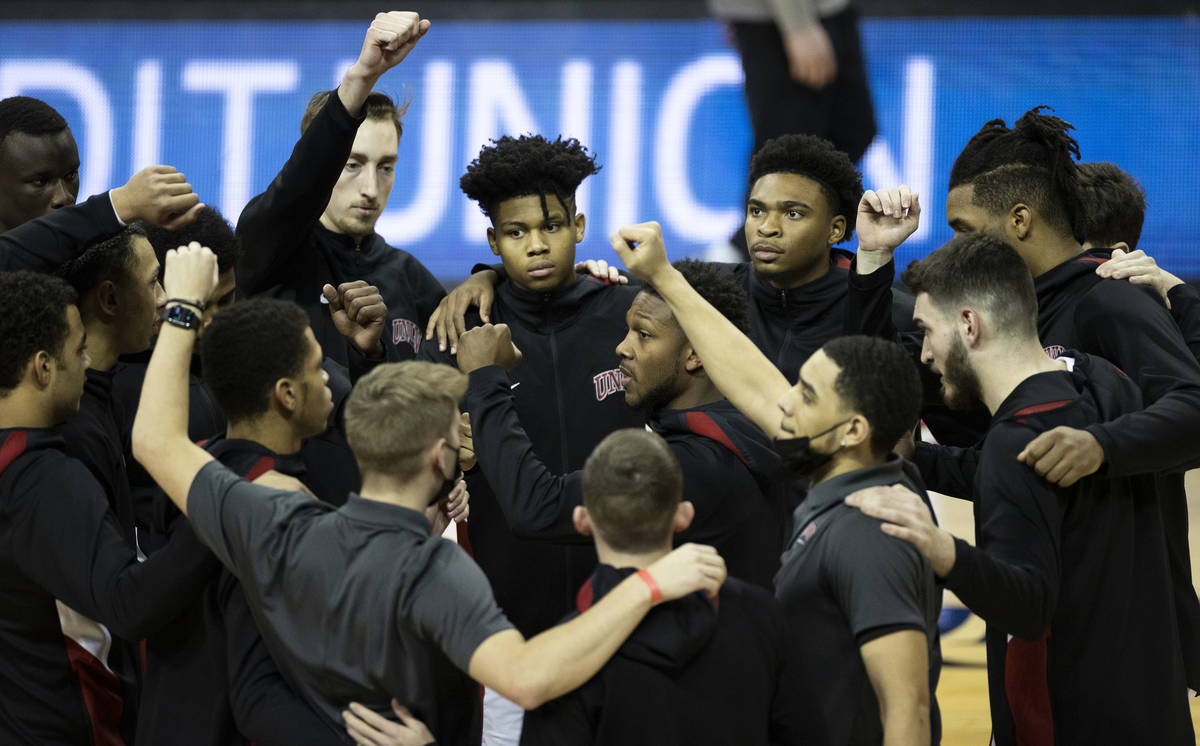 UNLV Rebel players meet before the start of an NCAA mens basketball game against Air Force on S ...