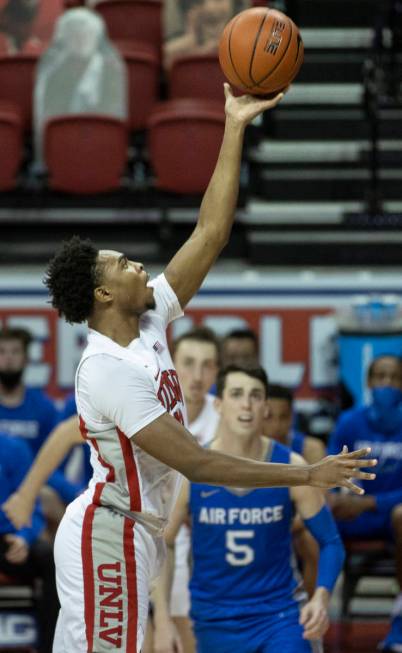 UNLV Rebels guard Bryce Hamilton (13) shoots over Air Force Falcons guard Chris Joyce (5) in th ...