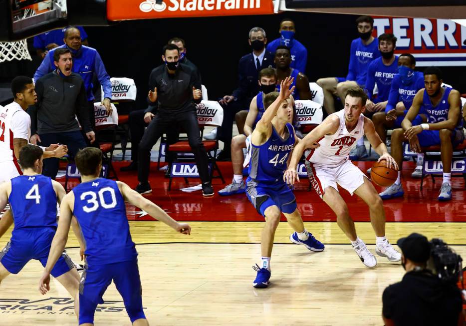 UNLV Rebels forward Moses Wood (1) drives to the basket against Air Force Falcons forward Keato ...