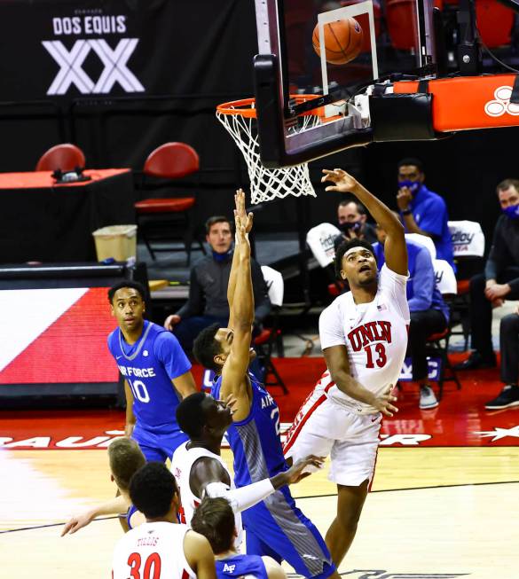 UNLV Rebels guard Bryce Hamilton (13) shotos against Air Force Falcons forward Nikc Jackson (22 ...