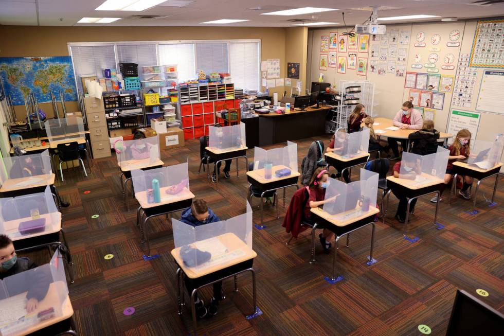 Students work in Joyelle Sampon's first grade class during school Coral Academy of Science Las ...