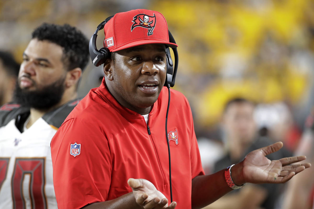 Tampa Bay Buccaneers offensive coordinator Byron Leftwich talks on the sidelines during the sec ...