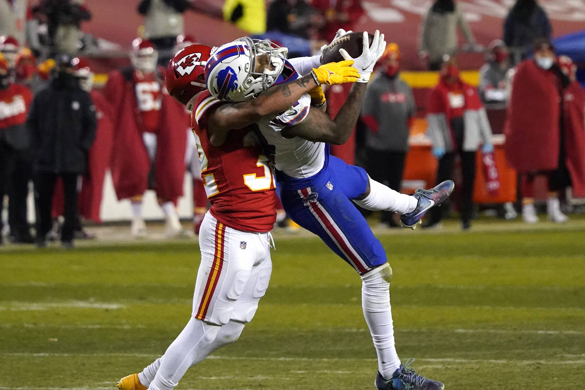 Buffalo Bills wide receiver Stefon Diggs is tackled by Kansas City Chiefs safety Tyrann Mathieu ...