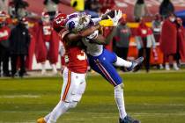 Buffalo Bills wide receiver Stefon Diggs is tackled by Kansas City Chiefs safety Tyrann Mathieu ...