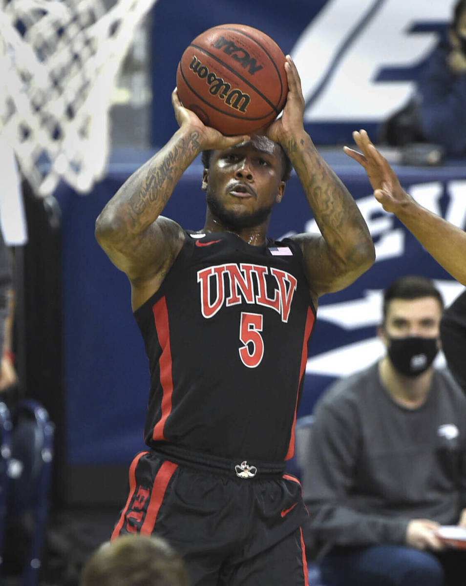 UNLV 's David Jenkins Jr. shoots against Nevada during the first half of an NCAA college basket ...