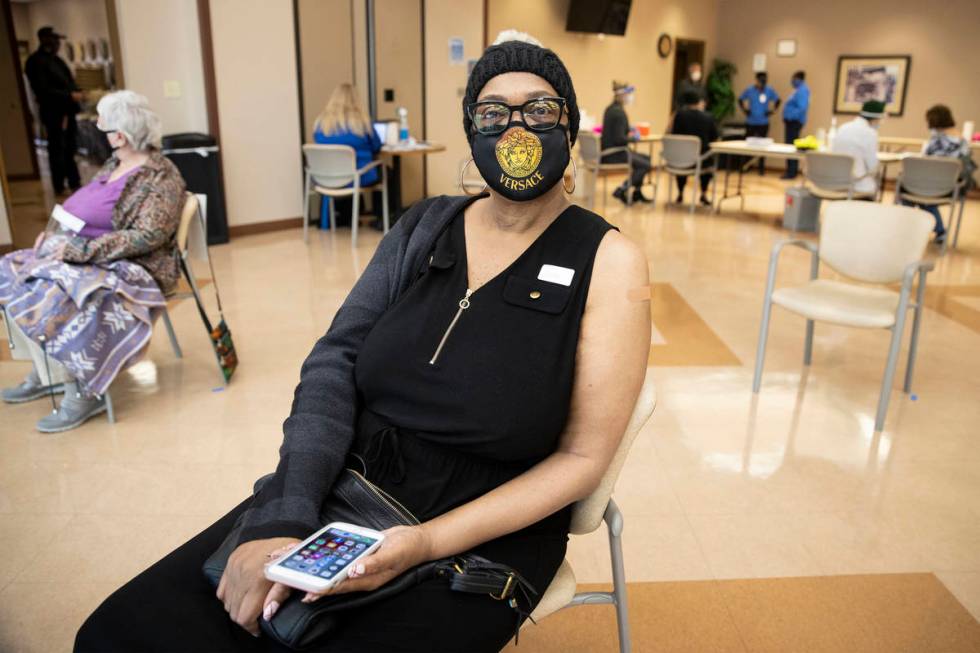 Martha Wilson, 70, rests after receiving the first dose of the COVID-19 vaccine at Doolittle Se ...