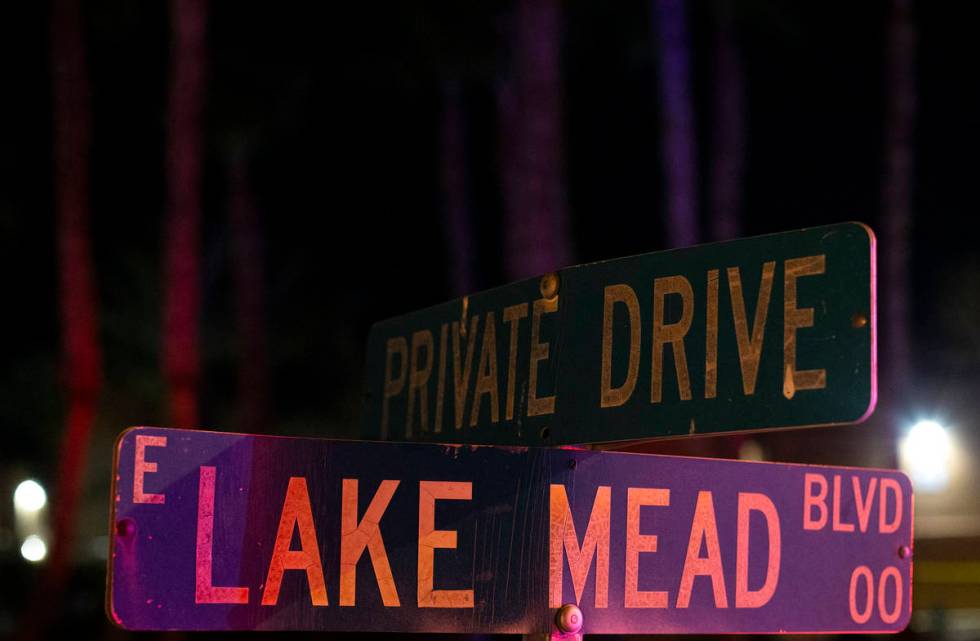 Metropolitan police investigate a homicide near the intersection of Lake Mead Boulevard and Los ...
